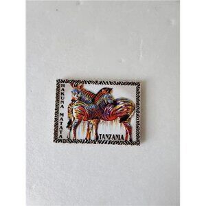 Hakuna Matata: Pair of Vibrant Zebras from Tanzania Grace Your Fridge with Color